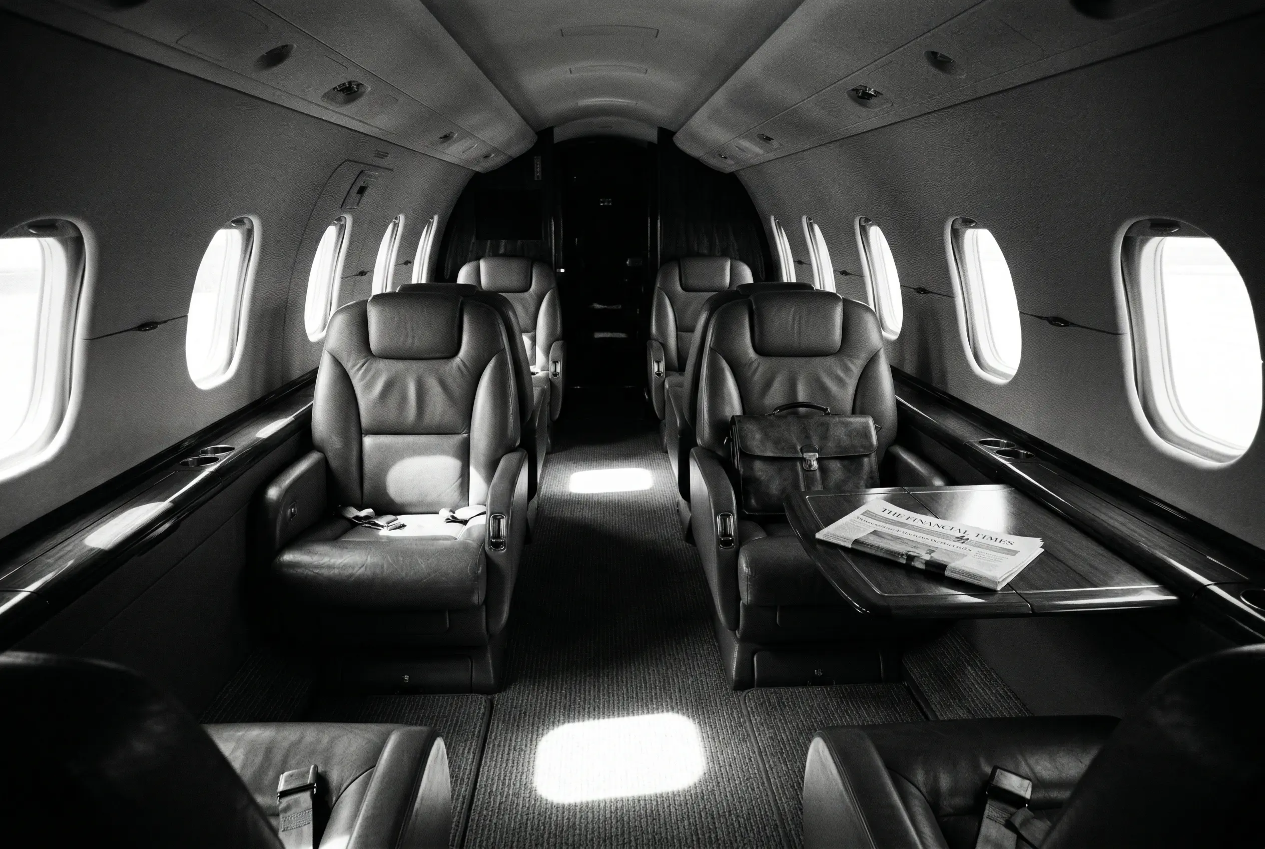 Hawker 800XP cabin interior with leather club seating and widest-in-class cross-section